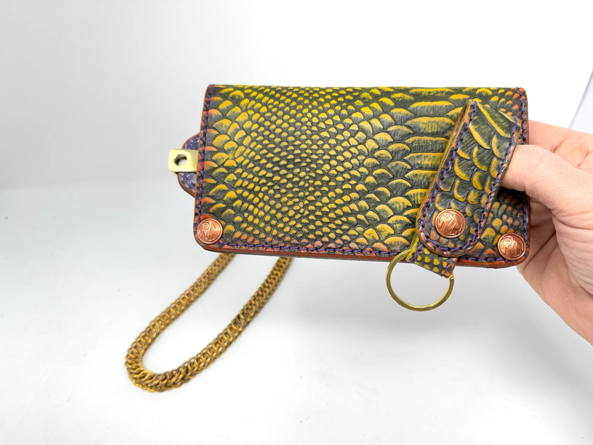 Python and Cowhide store Wristlet