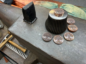 The Anvil Prayer Coin
